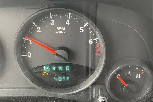 Will a Car Pass Vermont State Inspection With Check Engine Light On? | Girlington Garage in South Burlington, VT. Image of dashboard with check engine lights on.